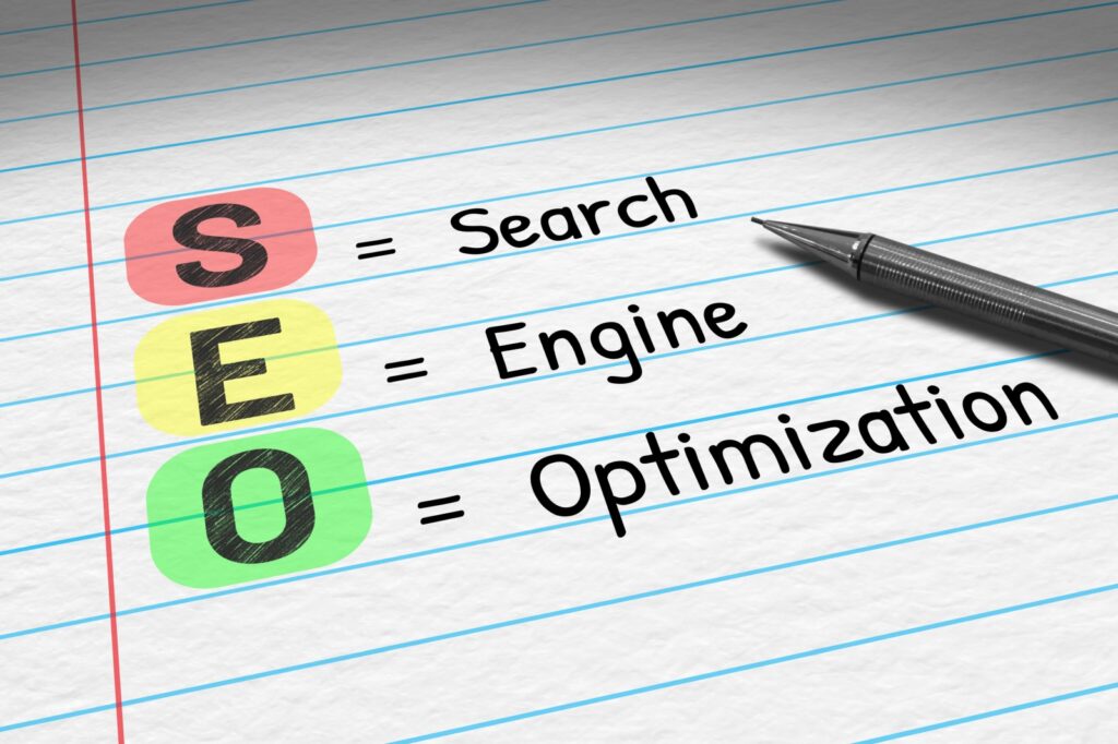 SEO - Search Engine Optimization. Business acronym on note pad.